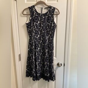 Woman’s size 2 blue and cream color sleeve less dress beautiful lace design